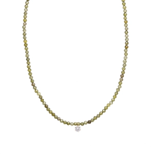 Minimalist olive green beaded necklace with sparkling zircon pendant on white background