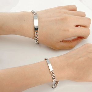 Classic silver titanium steel curb chain bracelet with blank metal plate on wrist