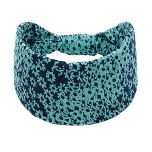 Detail of teal elastic headband featuring navy blue floral prints and a wide yoga-style band
