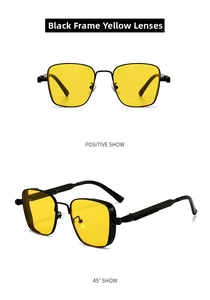 Detail view of steampunk metal frame with yellow lenses and precision screw hinges