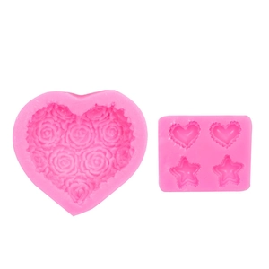 Juego de moldes de silicona rosa con formas de rosa corazón y estrella para chocolate