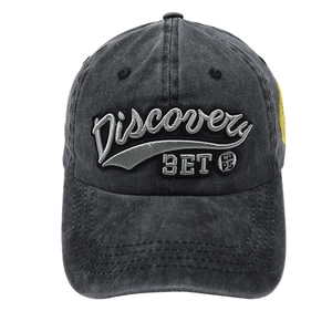 Macro detail of vintage washed baseball cap with Discovery 3D letter embroidery
