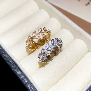 Elegant leaf rings with pearls and zircon stones in gold and silver plating