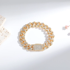 Detailed view of 8mm gold-plated Miami Cuban chain necklace with pave-set cubic zirconia