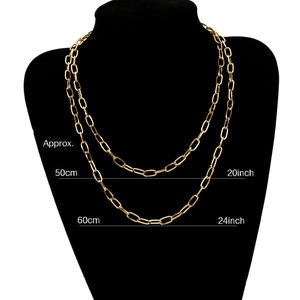 Hip hop titanium steel golden paperclip chain necklace for men and women on a black mannequin