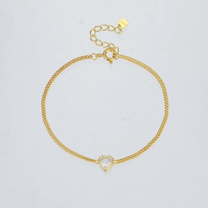 Elegant S925 sterling silver heart bracelet with a clear zircon stone in gold finish