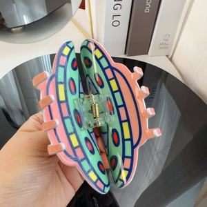 Colorful UFO shaped acrylic hair claw clip for creative cartoon sci-fi hair styling
