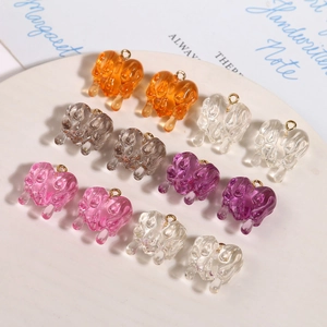 Melting heart resin pendants with gold loops in vibrant translucent colors for DIY jewelry