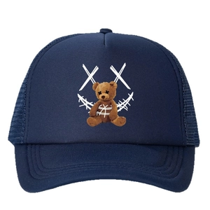 Dark blue mesh trucker hat featuring a brown teddy bear and graphic X print
