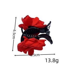 Floral medium hair claw clip with red fabric roses on black plastic frame, 6.5cm size