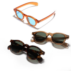 Three pairs of vintage round sunglasses in orange, brown, and tortoiseshell frames