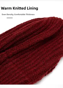 Macro detail of the thick warm knitted lining in vibrant red with a soft texture