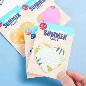 Hand holding heart-shaped summer party sticky notes with lemon and tropical patterns