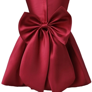 Elegant burgundy satin flower girl dress featuring a large bow on the back detail
