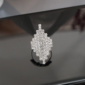 Sparkling silver plated four-piece jewelry set with pavé set white crystals for evening wear