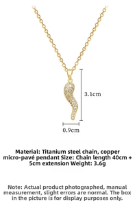 Close-up of gold pepper pendant with micro-set diamonds and titanium steel chain necklace