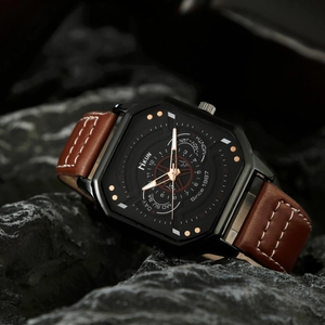 Macro view of MIKUN men's square watch with brown leather strap and rose gold markers