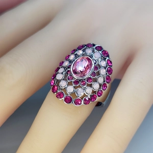 Exquisite pink crystal opal statement ring detail, glamorous multi-stone cocktail ring jewelry.