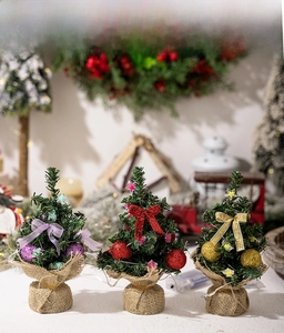 Three-piece mini tabletop Christmas trees with LED lights and burlap base decor
