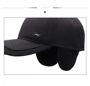 Detail view of winter baseball cap with ear flaps and thick warm lining for cold weather