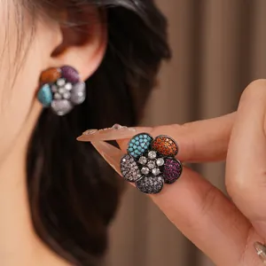 Vintage zircon flower earrings with colorful petals and silver needle studs