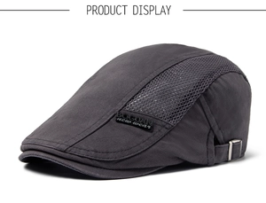 Detail view of charcoal gray mesh panel and metallic buckle on breathable flat cap
