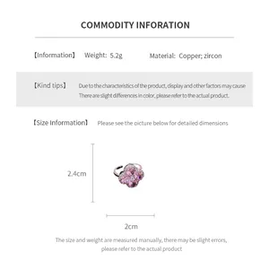 Detail showing height and width dimensions of a flower zircon open ring
