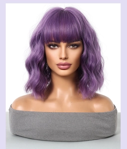 Macro shot of short wavy purple bob wig featuring soft texture and stylish blunt bangs