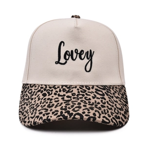 5-panel baseball cap with Lovey embroidery and leopard print brim on white background