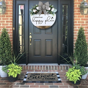 Round wooden welcome sign with bow and greenery for front door home wall decor