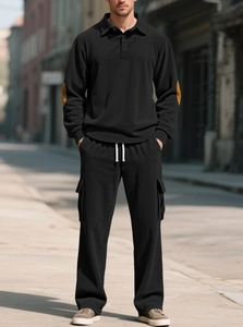 Men's black casual set with textured fabric, long sleeves and brown elbow patches