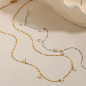 Collane in acciaio inossidabile oro e argento con perle d'acqua dolce e nappe raffinate