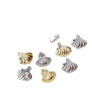 Mixed gold and silver shell charms with pearls and blue crystals for DIY jewelry