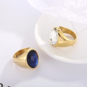 Retro gold plated stainless steel ring with large oval blue and clear gemstones