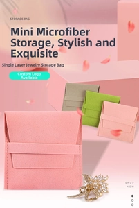 Close-up of pink microfiber jewelry pouches with neat stitching and envelope flap closure