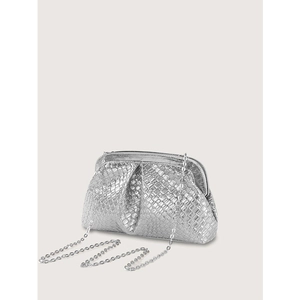 Detail of silver woven texture clutch bag with metallic finish and thin chain strap