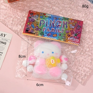 Close-up of cat squishy toy in packaging with product dimensions 8cm by 6cm