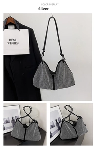 Detailed view of luxury rhinestone tote bag with shimmering silver crystals and black straps