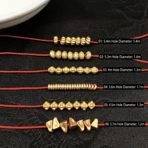 Assorted gold spacer beads for DIY jewelry making with diverse vintage metal textures