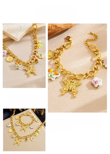 Detail view of gold-plated butterfly charms and colorful enamel flower jewelry set