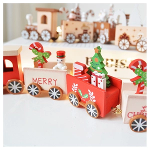 Close-up of wooden Christmas train featuring mini snowmen, trees and holiday gifts