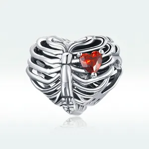 925 sterling silver skeleton heart charm bead featuring a vibrant red heart cubic zirconia