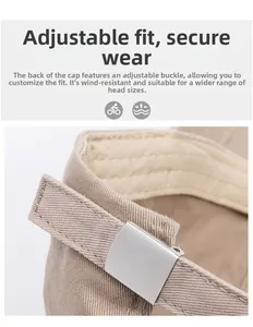 Detail of light khaki baseball cap with adjustable silver metal buckle on back