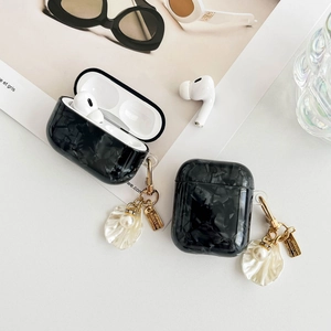 Glossy black shell pattern AirPods Pro 2 case with elegant pearl and seashell pendant charm