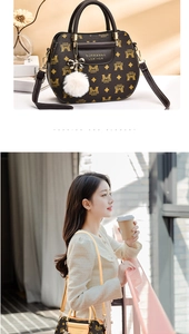 Detail view of brown patterned monogram handbag with plush charm and chain bow accessory