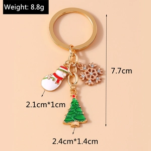 Detailed view of Christmas keychain with snowman and tree pendants showing dimensions