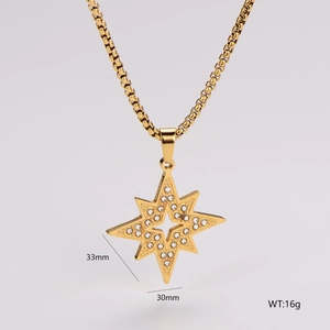 Detail view of gold star pendant necklace showing 33mm by 30mm dimensions and 16g weight