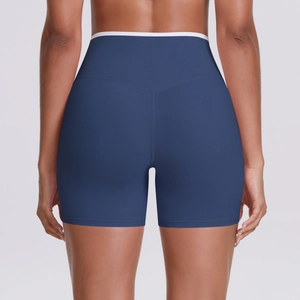 High-waisted navy yoga shorts with V-shaped back seam and white contrast waistband