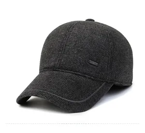 Close-up of charcoal grey wool winter cap showing fine stitching and fabric texture