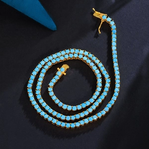Retro brass gilded tennis necklace with 3mm turquoise stones on a black background